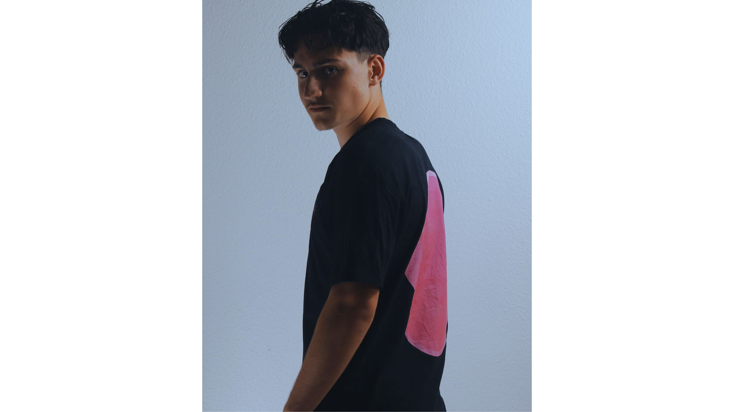 Black/pink T - shirt, loose fit.