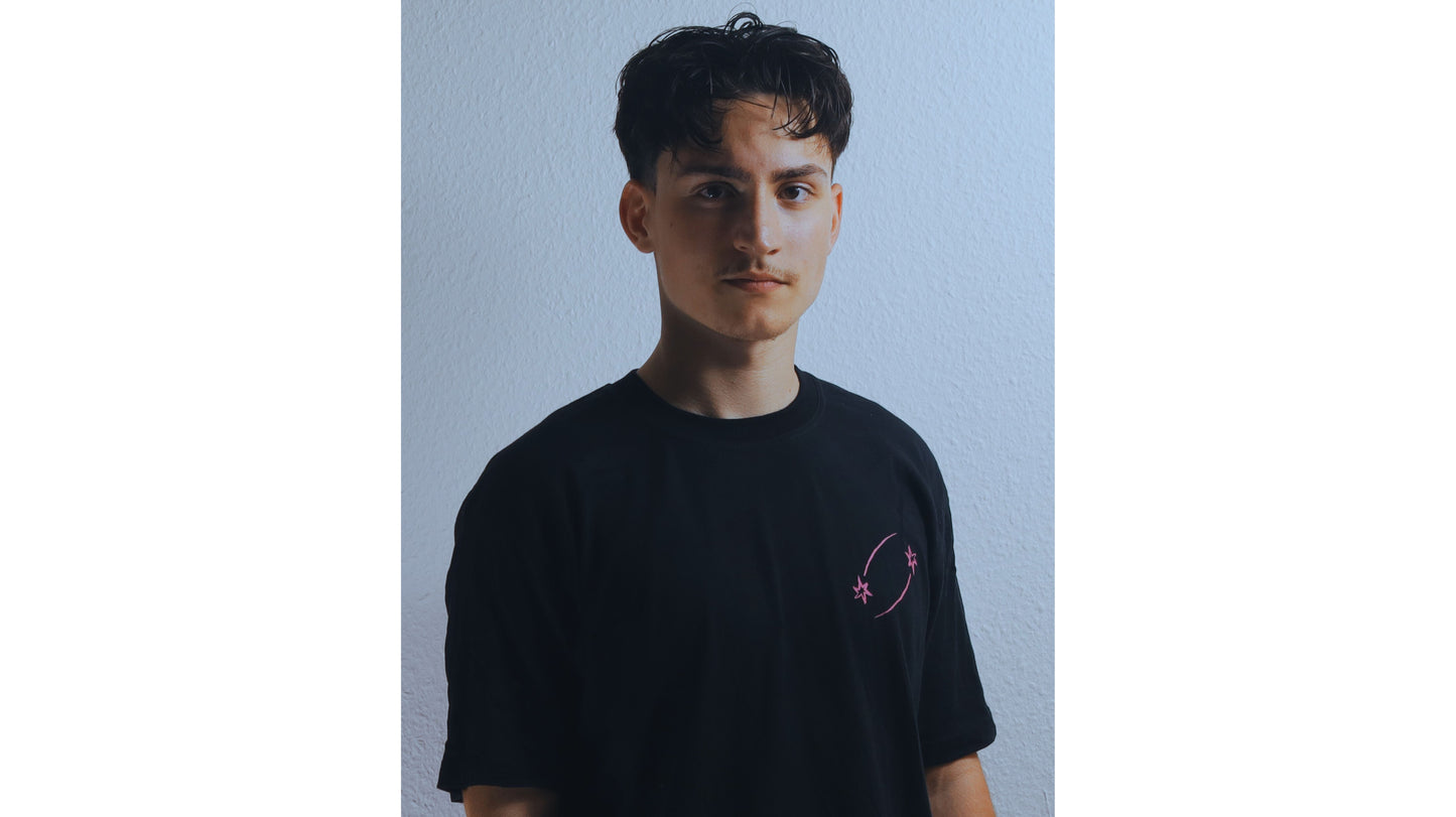 Black/pink T - shirt, loose fit.