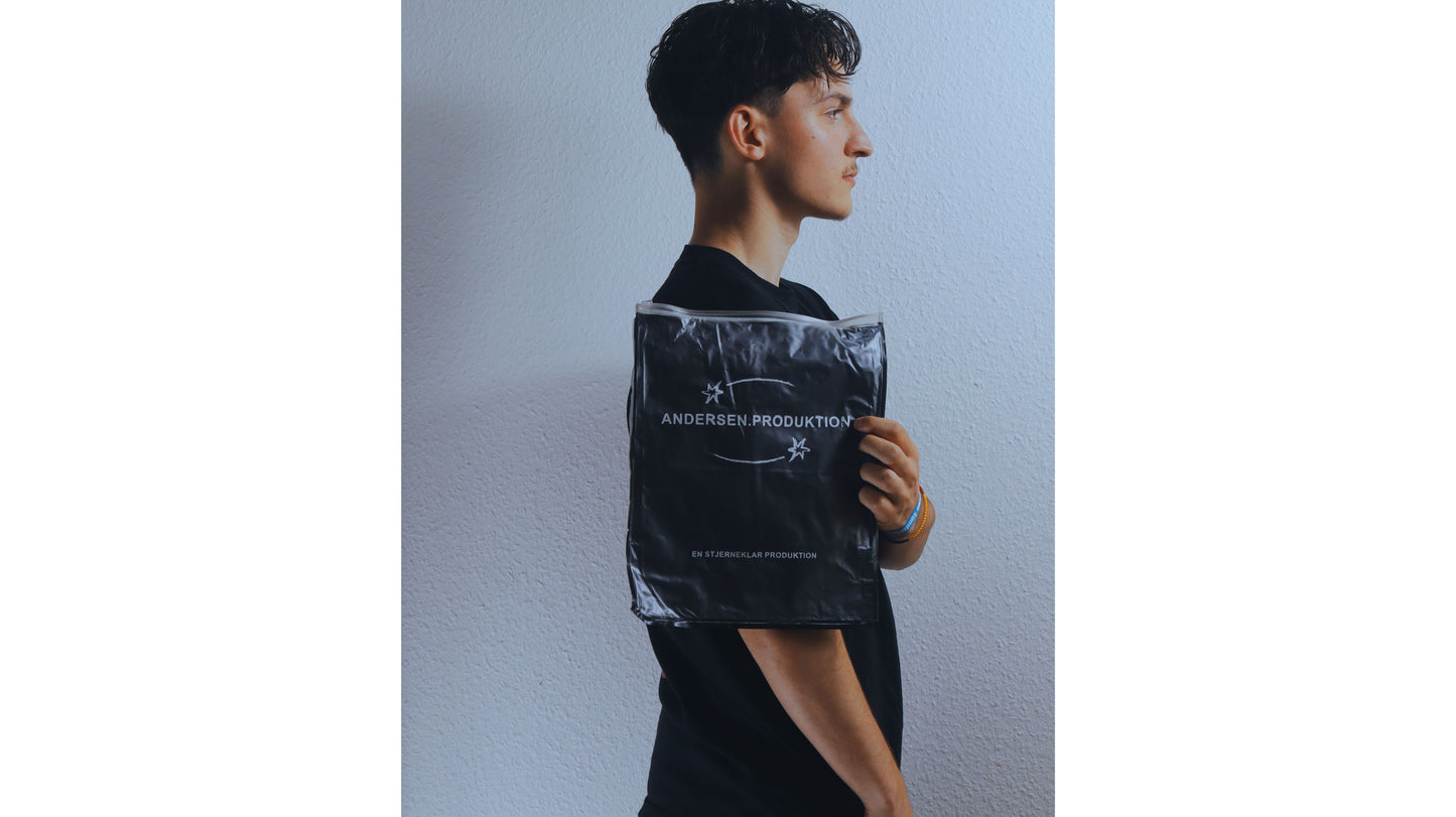 Black/pink T - shirt, loose fit.