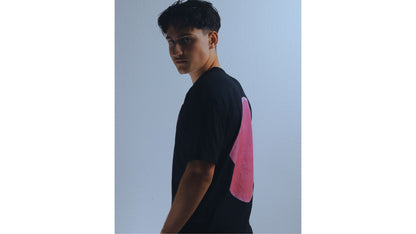 Black/pink T - shirt, loose fit.